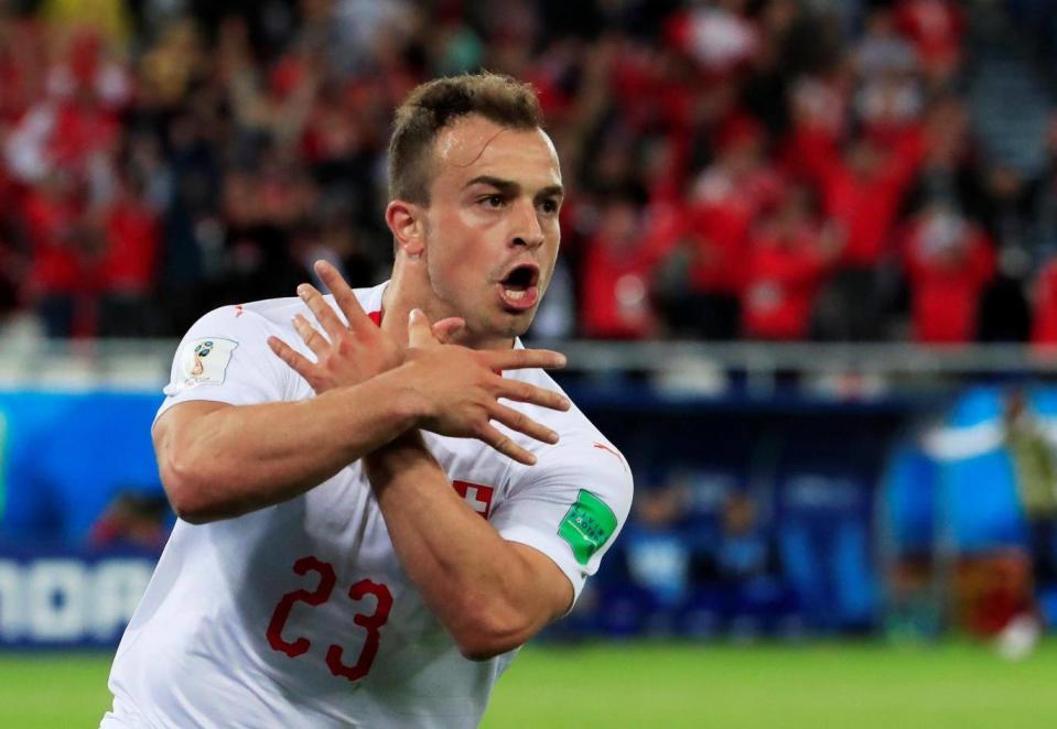 Xherdan Shaqiri marked his goal against Serbia by making a gesture with his hands in apparent nod to the Albanian flag (Reuters)
