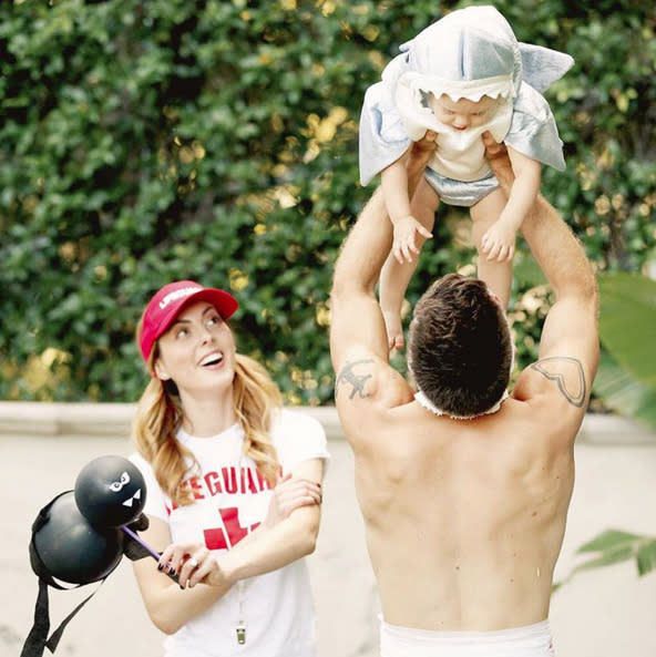 Danger, sharks ahead! Eva Amurri Martino played lifeguard, while her husband, Kyle Martino, was the victim of a shark attack. Their little one, Marlowe Mae, is who took that big bite. Yikes! (Instagram)