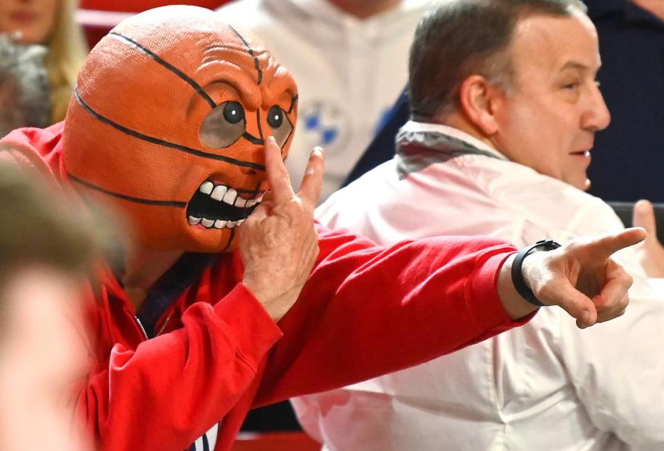A Dayton Flyers fan keeps his eyes on the team as they prepare to battle the Davidson Wildcats at Belk Arena in Davidson, NC on Wednesday, January 3, 2024. The Flyers defeated the Wildcats 72-59. JEFF SINER/jsiner@charlotteobserver.com