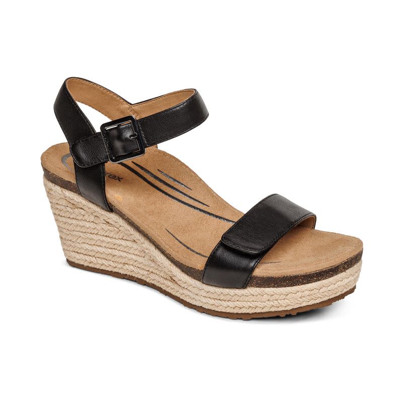 <p><a href="https://go.redirectingat.com?id=74968X1596630&url=https%3A%2F%2Fwww.aetrex.com%2Fsydney-espadrille-wedge-black-leather-EW750W.html%3Fdwvar_EW750W_color%3Dblack-leather%26quantity%3D1&sref=https%3A%2F%2Fwww.thepioneerwoman.com%2Ffashion-style%2Fg32463219%2Fcomfortable-wedges%2F" rel="nofollow noopener" target="_blank" data-ylk="slk:Shop Now;elm:context_link;itc:0;sec:content-canvas" class="link ">Shop Now</a></p><p>Sydney Quarter Strap Espadrille Wedge</p><p>aetrex.com</p><p>$149.95</p><span class="copyright">Aetrex</span>