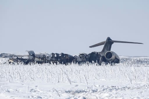 The wreckage of a US Bombardier E-11A jet is seen here after it went down in Taliban-controlled territory in eastern Afghanistan