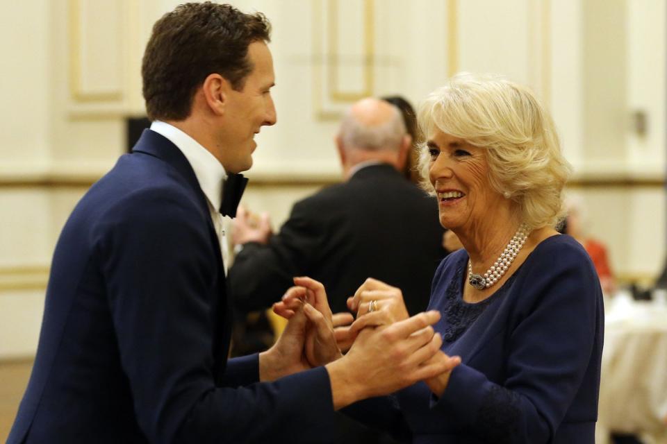 Dancing shoes: Brendan Cole with Duchess of Cornwall: PA