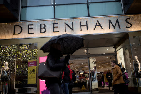 FILE PHOTO: Shoppers walk past the Debenhams department store on Oxford Street in London, Britain December 15, 2018. REUTERS/Simon Dawson/File Photo