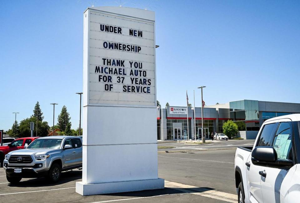 The former Michael Toyota car dealership on Blackstone Avenue at Bullard in Fresno shows a thank you to the Michael Automotive Group on a marquee and temporary signage in the background on Monday, June 27, 2022. Michael Automotive Group, Fresno dealerships that were owned by Mike Rosvold for nearly four decades, were sold to Steve Cornelius and will now have the name Blackstone.