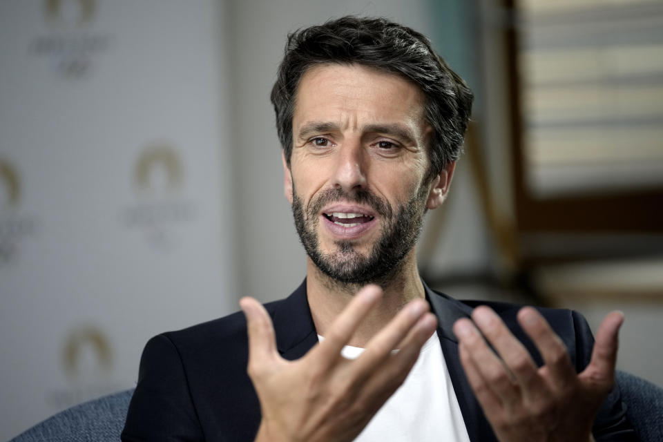 Paris 2024 Olympics Organizing Committee President Tony Estanguet pauses during an interview with the Associated Press gestures during an interview at the headquarters of Paris 2024 in Saint-Denis, outside Paris, France, Tuesday, June 27, 2023. (AP Photo/Christophe Ena)