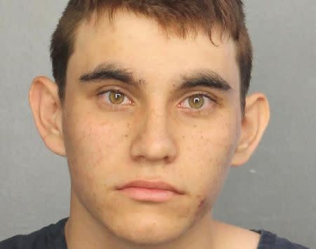 Nikolas Cruz appears in a police booking photo after being charged with 17 counts of premeditated murder following a Parkland school shooting, at Broward County Jail in Fort Lauderdale, Florida, U.S. February 15, 2018. Broward County Sheriff/Handout via REUTERS