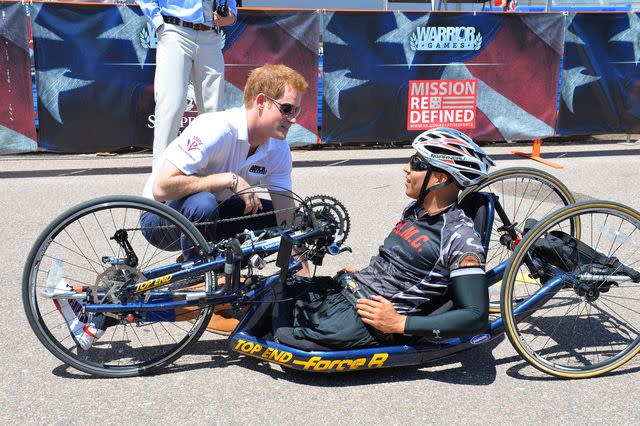 <p>John Stillwell/PA Images via Getty</p> Prince Harry at the 2013 Warrior Games