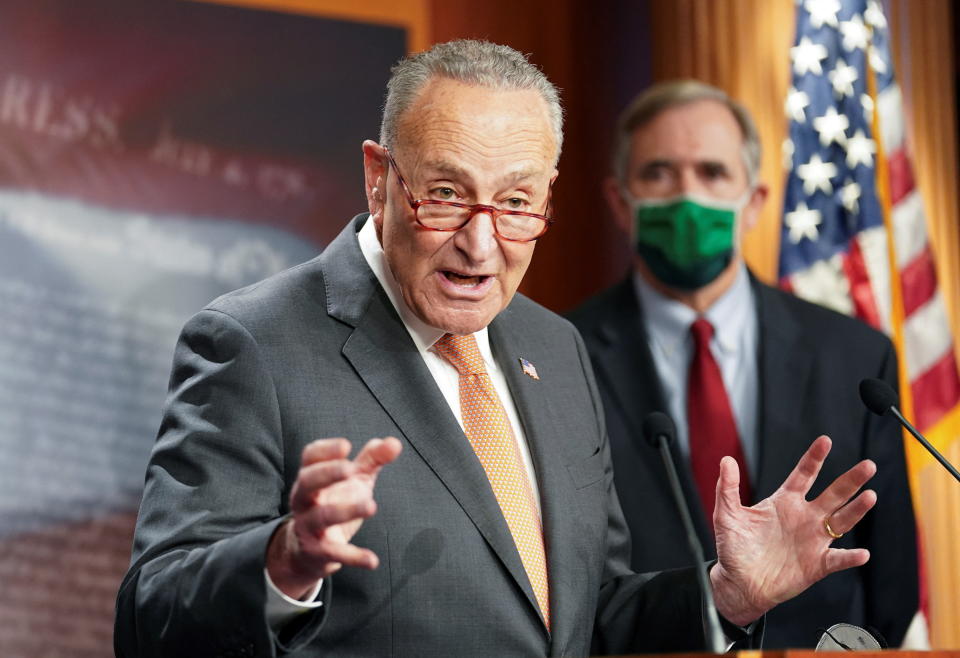 U.S. Senate Majority Leader Chuck Schumer (D-NY) speaks to reporters at the U.S. Capitol in Washington, U.S., January 4, 2022. REUTERS/Kevin Lamarque