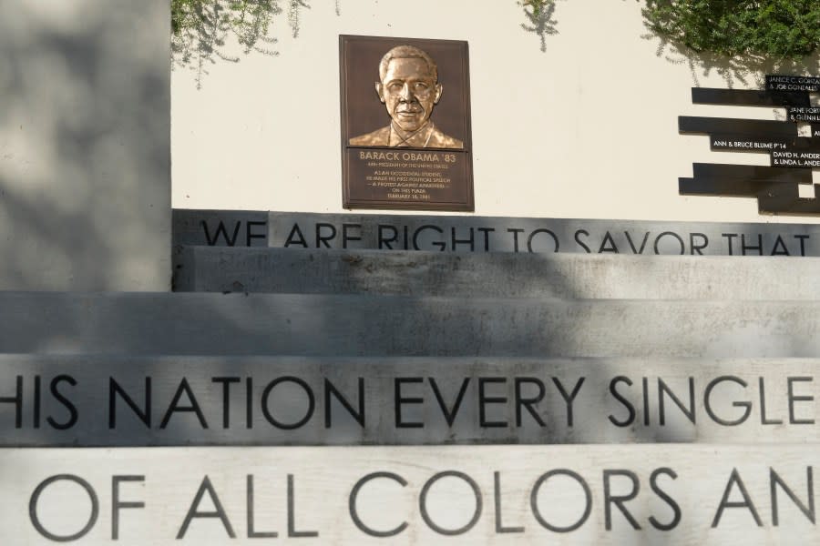 Words decorate the concrete steps up to a bronze plate with the likeness of former President Barack Obama at the Plaza where then student Obama made his first political speech in 1981 at Occidental College. (AP Photo/Damian Dovarganes)