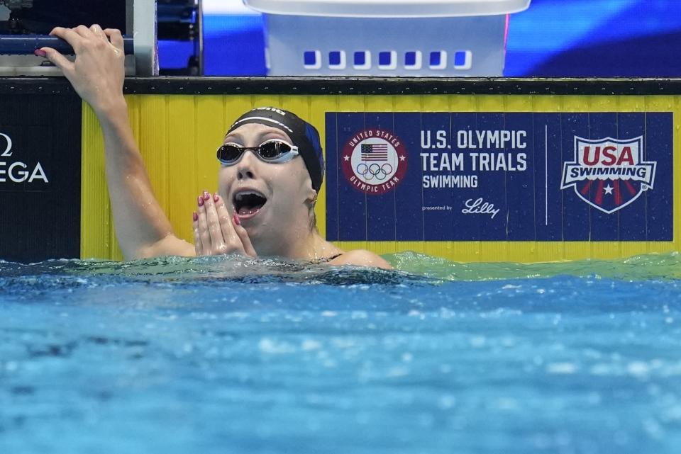 Gretchen Walsh reacts to her world record in her Women's 100 butterfly semifinals heat Saturday, June 15, 2024, at the US Swimming Olympic Trials in Indianapolis. (AP Photo/Michael Conroy)