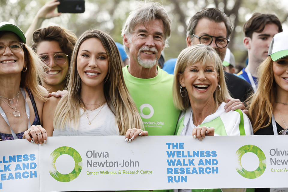 Olivia with husband John Easterling and daughter Chloe Lattanzi at the Olivia Newton-John Wellness Walk and Research Run in 2019. Photo: Getty