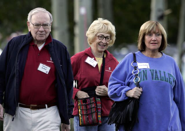 <p>Elaine Thompson/AP</p> Warren Buffett, Astrid Buffett and Susie Buffett at the annual Allen & Co. media conference in Sun Valley, Idaho on July 14, 2006.