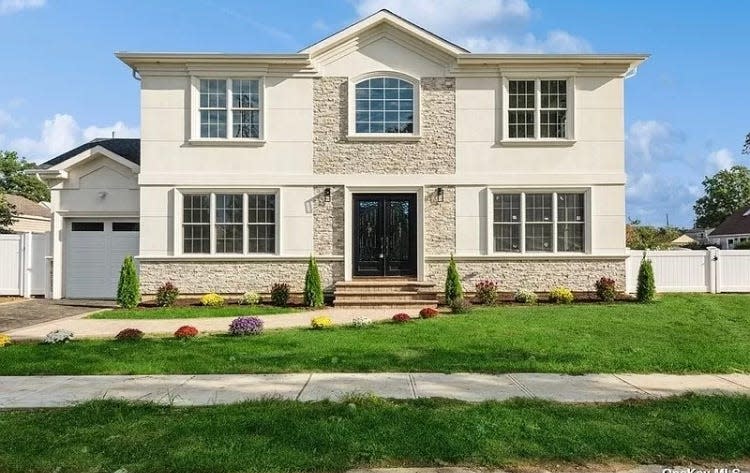 This Levitt-built house at 89 Cornflower Road in Levittown, New York is listed at $1.38 million.
