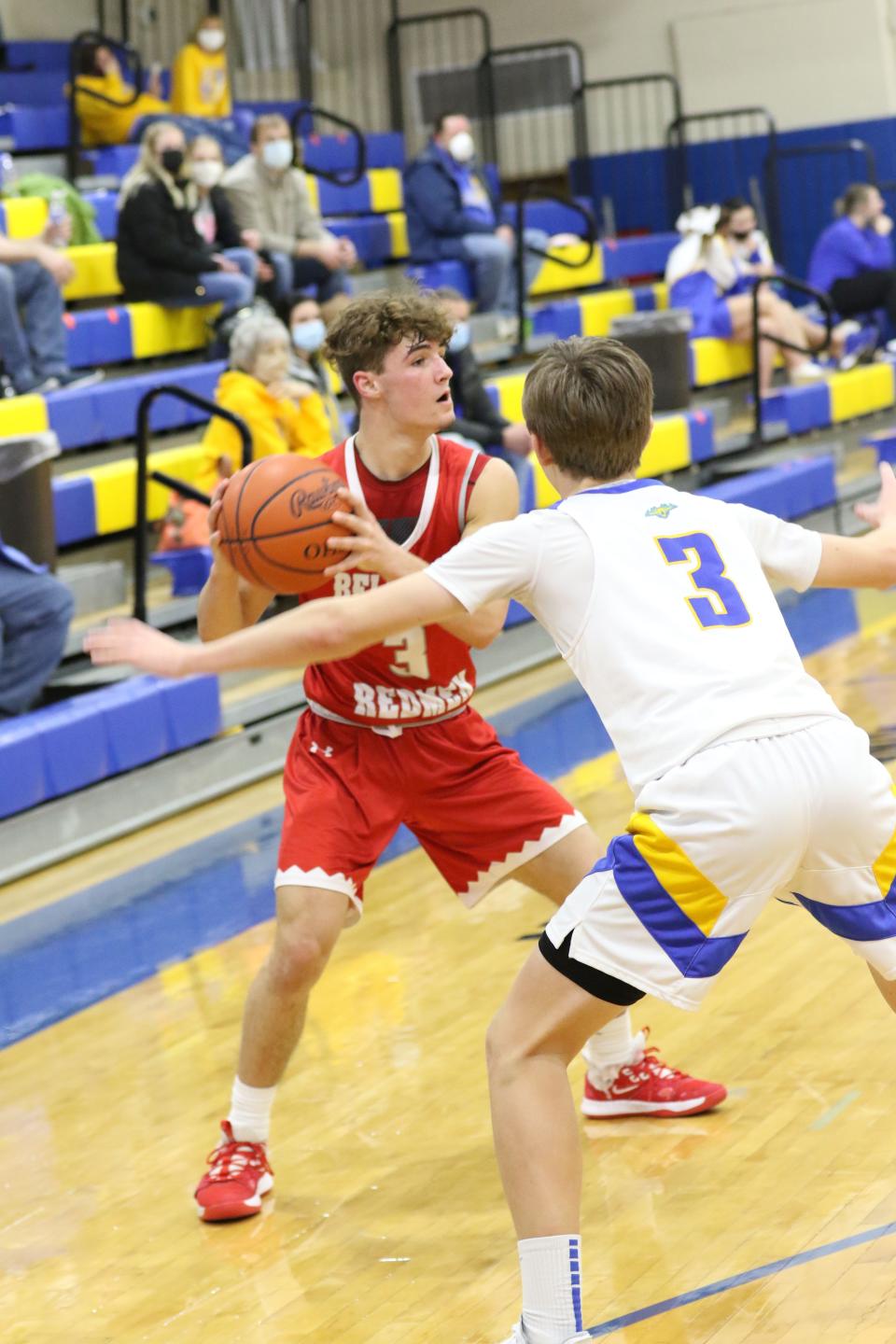 Bellevue's Tyler Ray looks to pass.