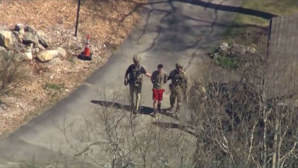 PHOTO: Suspected classified document leaker and U.S National Guardsman, Jack Teixeira, is taken into custody by FBI agents in North Dighton, Mass., April 13, 2023. (WCVB)