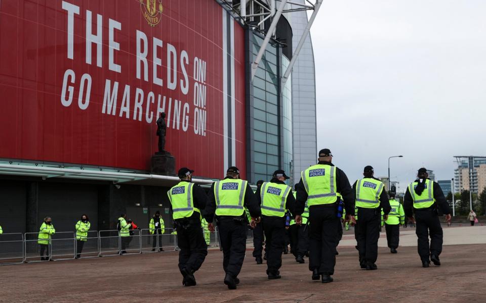 The police outside Old Trafford - Telegraph