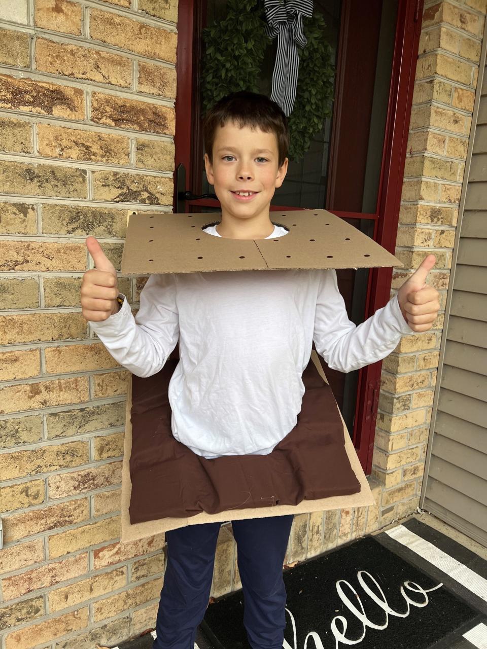 Oshkosh's Austin Otto, 9, poses in his s'mores Halloween costume.