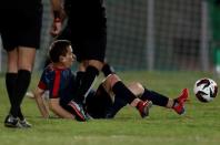 Ezzeldin Bahader, a 74-years-old Egyptian football player of 6th October Club is seen in action during a soccer match against El Ayat Sports Club of Egypt's third division league at the Olympic Stadium in the Cairo suburb of Maadi