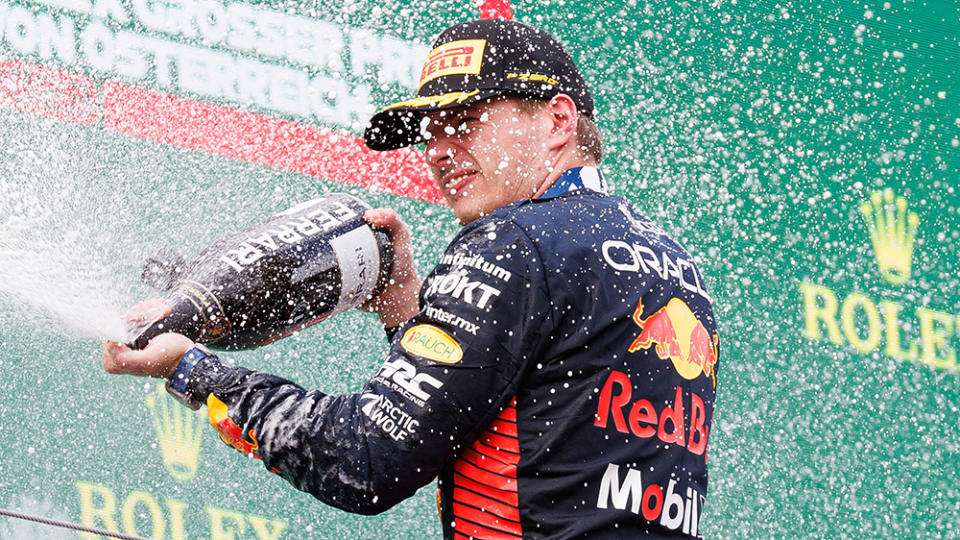 SPIELBERG, AUSTRIA - JULY 02: Max Verstappen of Netherlands and Oracle Red Bull Racing celebrates the victory of the GP of Austria on the podium during the F1 Grand Prix of Austria at Red Bull Ring on July 02, 2023 in Spielberg, Austria. (Photo by Emmanuele Ciancaglini/Ciancaphoto Studio/Getty Images)