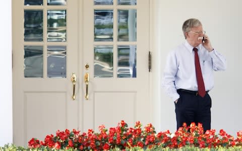 John Bolton at the White House earlier on Tuesday - Credit: &nbsp;Tom Brenner/Bloomberg