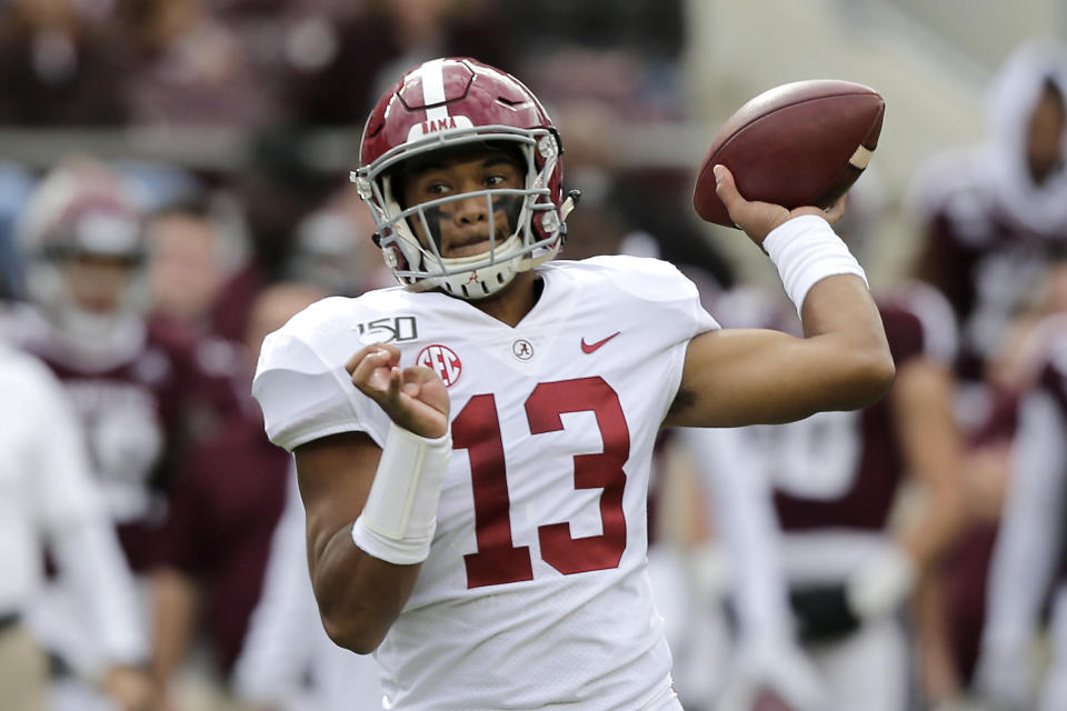 Alabama quarterback Tua Tagovailoa (13) passes downfield against Texas A&M during the second half of an NCAA college football game, Saturday, Oct. 12, 2019, in College Station, Texas. (AP Photo/Sam Craft)