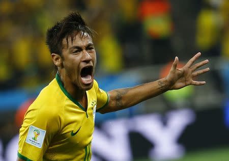 Brazil's Neymar celebrates his goal against Croatia during their 2014 World Cup opening match at the Corinthians arena in Sao Paulo June 12, 2014. REUTERS/Damir Sagolj