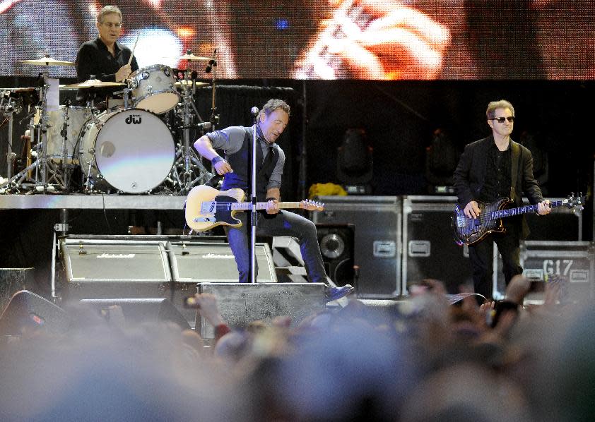 Bruce Springsteen and the E Street Band perform during the 2014 NCAA March Madness Music Festival - Capital One JamFest, Sunday, April 6, 2014, in Dallas. (Photo by Matt Strasen/Invision/AP)