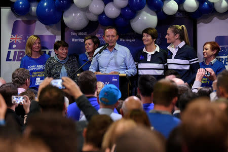 Australia's former Prime Minister and Warringah Liberal candidate Tony Abbott is joined on stage by family members after conceding defeat at Manly Leagues Club in Brookvale, Sydney, Australia, May 18, 2019. AAP Image/Bianca De Marchi/via REUTERS