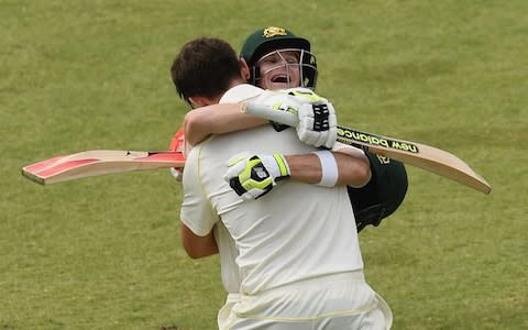 Mitch Marsh of Australia is congratulated by Steve Smith after making a century during day three of the Third Test match during the 2017/18 Ashes Series between Australia and England at WACA  - Credit: Quinn Rooney/Getty Images