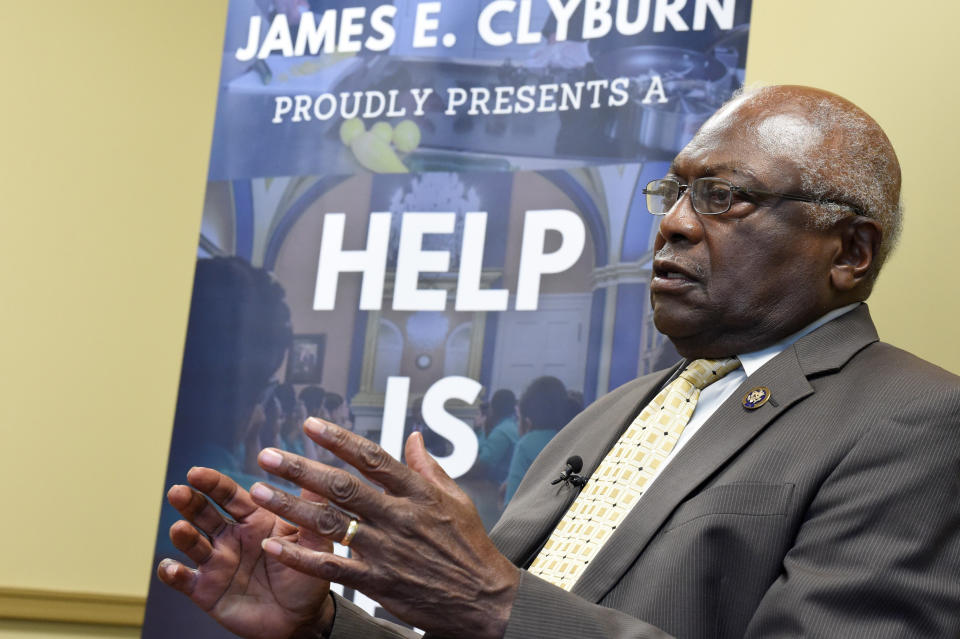 U.S. House Majority Whip Jim Clyburn speaks with reporters ahead of a town hall meeting in his district on Wednesday, July 14, 2021, in Hopkins, S.C. (AP Photo/Meg Kinnard)