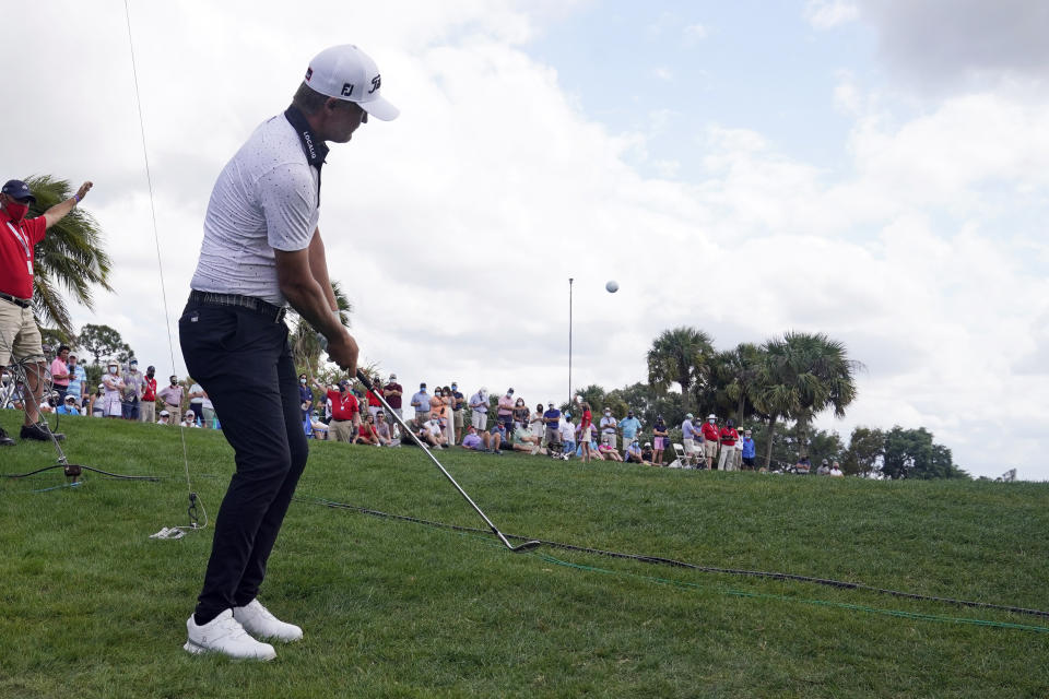 Matt Jones, of Australia, hits from the rough on the sixth hole during the third round of the Honda Classic golf tournament, Saturday, March 20, 2021, in Palm Beach Gardens, Fla. (AP Photo/Marta Lavandier)