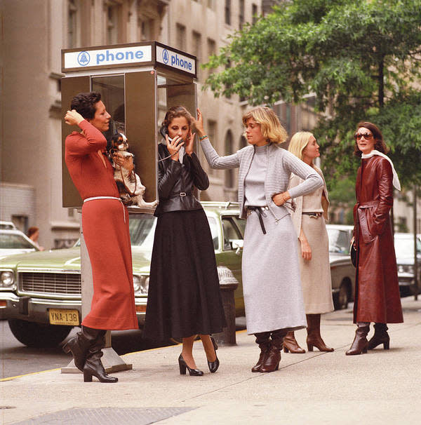 For his 1973 75-piece made-to-order collection, the equivalent of European couture, friends of Halston, Elsa Peretti, Betsy Theodoracopulos, Berry Berenson, Sandy Kirkland and Kitty Hawks model long-length dresses in luxe knitwear with leather styled with accessories from designer Peretti while walking in Manhattan.