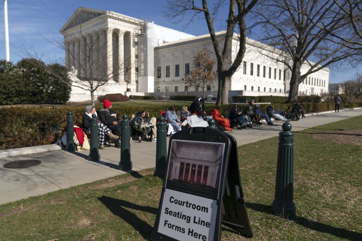 Even a day before the oral arguments, a line had formed outside the Supreme Court to sit in on the court's session. <a href="https://newsroom.ap.org/detail/Election2024TrumpInsurrectionAmendment/2e5e06595e7441d3a9bb5c465301f565/photo" rel="nofollow noopener" target="_blank" data-ylk="slk:AP Photo/Jose Luis Magana;elm:context_link;itc:0;sec:content-canvas" class="link ">AP Photo/Jose Luis Magana</a>