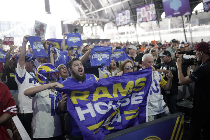 Los Angeles Rams fans cheer before the second round of the NFL football draft Friday, April 29, 2022, in Las Vegas. (AP Photo/Jae C. Hong)