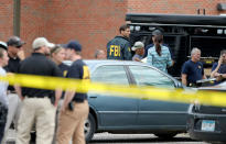 <p>Law enforcement officials investigate an explosion at the Dar Al-Farooq Islamic Center in Bloomington, Minn., on Saturday, Aug. 5, 2017. (Photo: David Joles/Star Tribune via AP) </p>