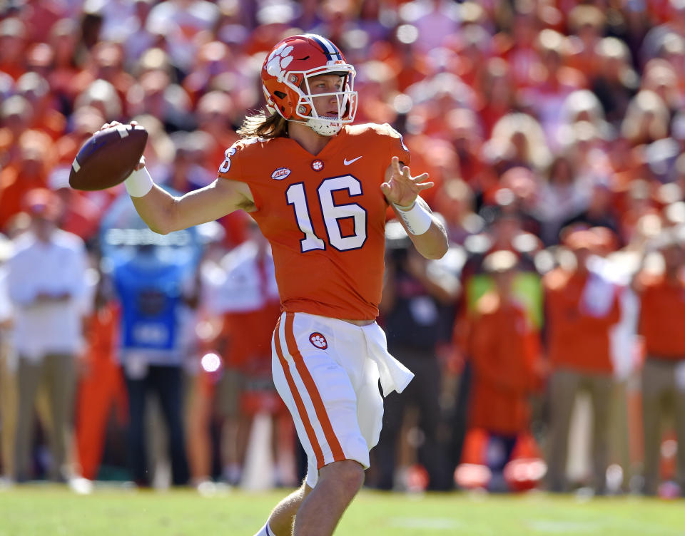 Clemson’s Trevor Lawrence drops back to pass during the first half of an NCAA college football game against Louisville, Saturday, Nov. 3, 2018, in Clemson, S.C. (AP Photo/Richard Shiro)