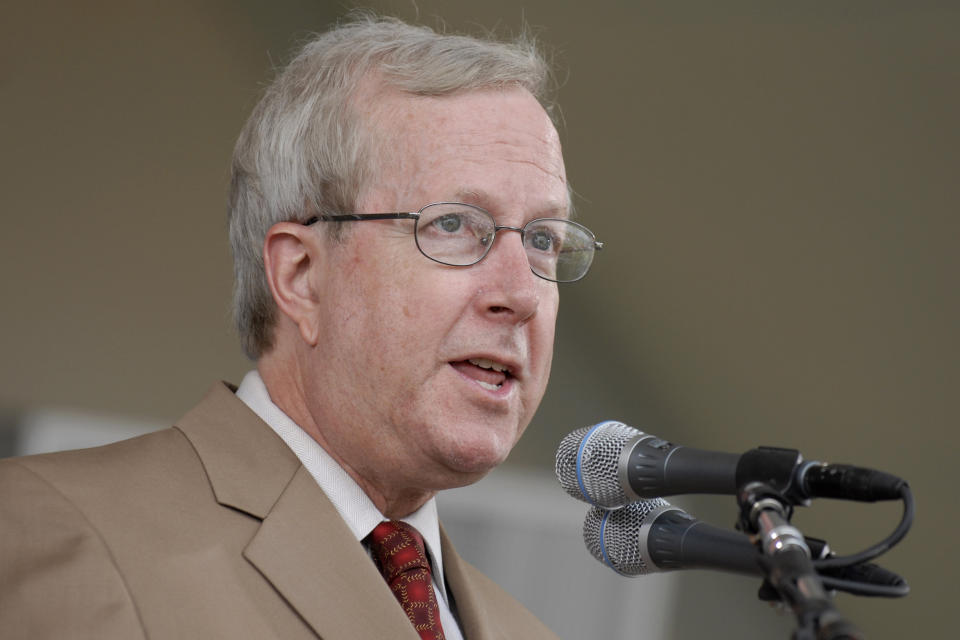 FILE - Rick Hummel, a writer for the St. Louis Post-Dispatch, speaks after receiving the J.G. Taylor Spink Award during the National Baseball Hall of Fame Induction Ceremony in Cooperstown, N.Y. Sunday, July 29, 2007. Hummel, an esteemed writer who covered the St. Louis Cardinals and Major League Baseball for five decades for the Post-Dispatch until his retirement in 2022, died Saturday, May 20, 2023, after a short, unspecified illness the Post-Dispatch said Monday. He was 77. (AP Photo/Tim Roske, File)