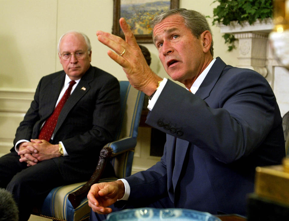 FILE - President George W. Bush, right, with Vice President Dick Cheney at his side, speaks during a meeting with congressional leaders in the White House Oval Office on Sept. 18, 2002. A new CNN Films documentary explores the role of the U.S. vice presidency, which in modern times has emerged into a more powerful position. Still, the film notes that a veep’s duties are all up to the president. (AP Photo/Doug Mills, File)