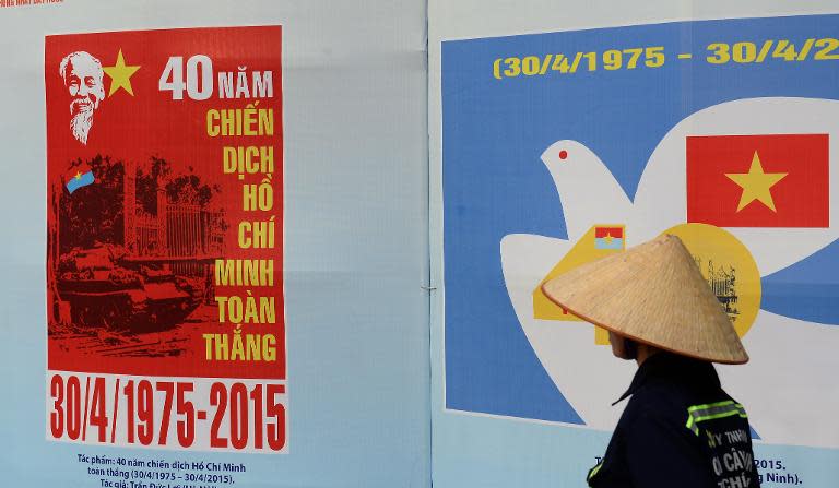 Propaganda posters displayed at an exhibition marking the 40th anniversary of the fall of Saigon, in downtown Ho Chi Minh City