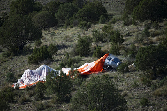 The capsule lies in the desert after a hard landing during the second manned test flight for Red Bull Stratos in Roswell, New Mexico, USA on July 25, 2012.