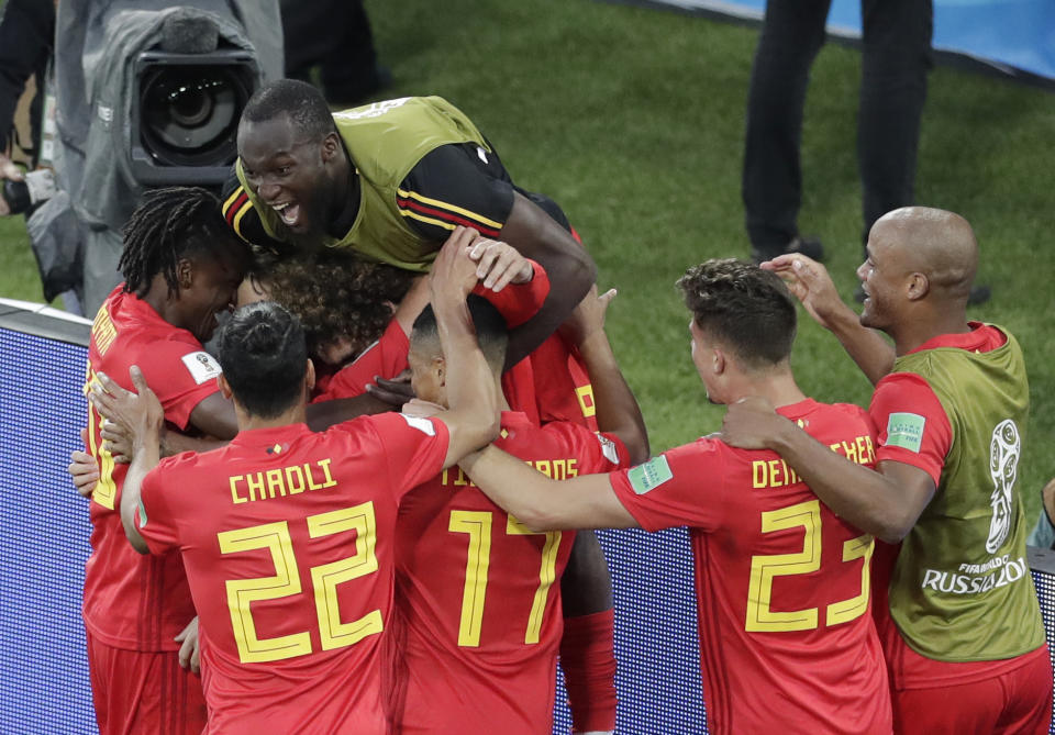 <p>Adnan Januzaj is congratulated by his teammates after scoring a wonderful opening goal against England </p>