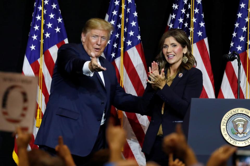 <div class="inline-image__caption"><p>Donald Trump and Gov. Kristi Noem at 2018 fundraiser.</p></div> <div class="inline-image__credit">Kevin Lamarque/Reuters</div>