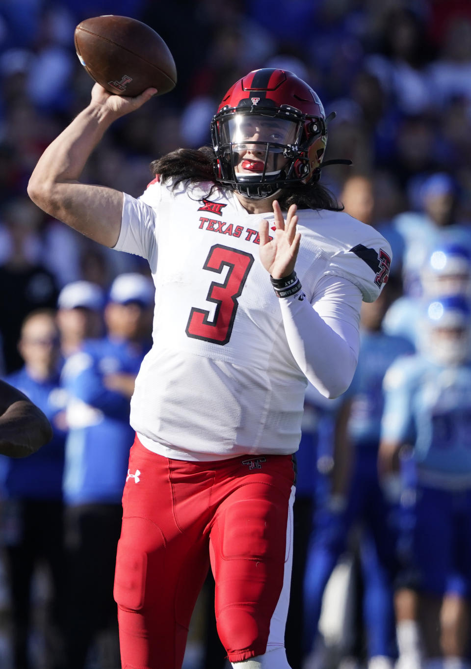Texas Tech quarterback Henry Colombi (3) looks to pass against Kansas during the first quarter of an NCAA college football game Saturday, Oct. 16, 2021, in Lawrence, Kan. (AP Photo/Ed Zurga)
