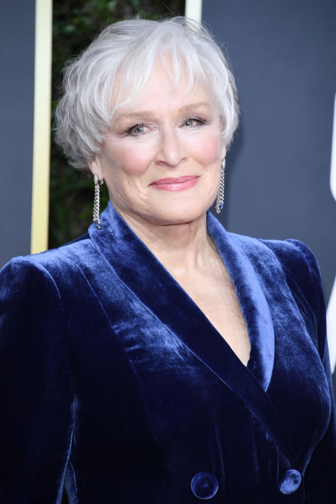 <p>In 2019, Glenn Close first showed off her gray roots at the Golden Globes, but since, the actress has effortlessly embraced a full gray look. One year later at the 77th Golden Globe Awards, she paired a gorgeous, blue velvet gown with a silvery bob, and <em>wow</em>. </p>