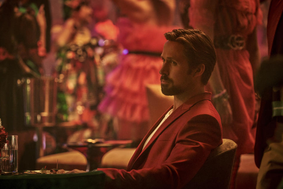 This image released by Netflix shows Ryan Gosling in a scene from "The Gray Man." (Paul Abell/Netflix via AP)