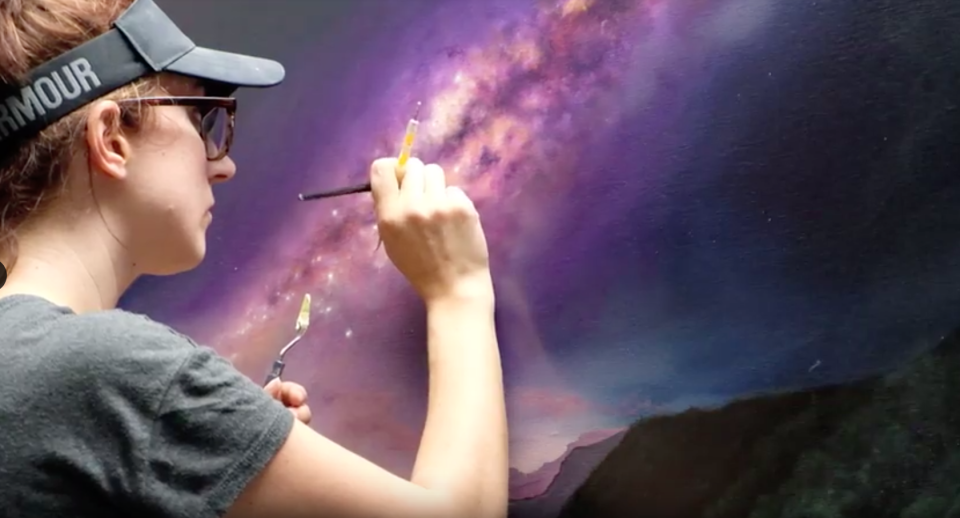 Machin working on a painting. Source: Yahoo Finance Video