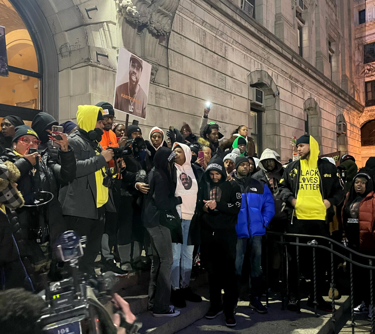 Paterson, N.J., residents and anti-violence activists from around the region gather on the steps of City Hall.