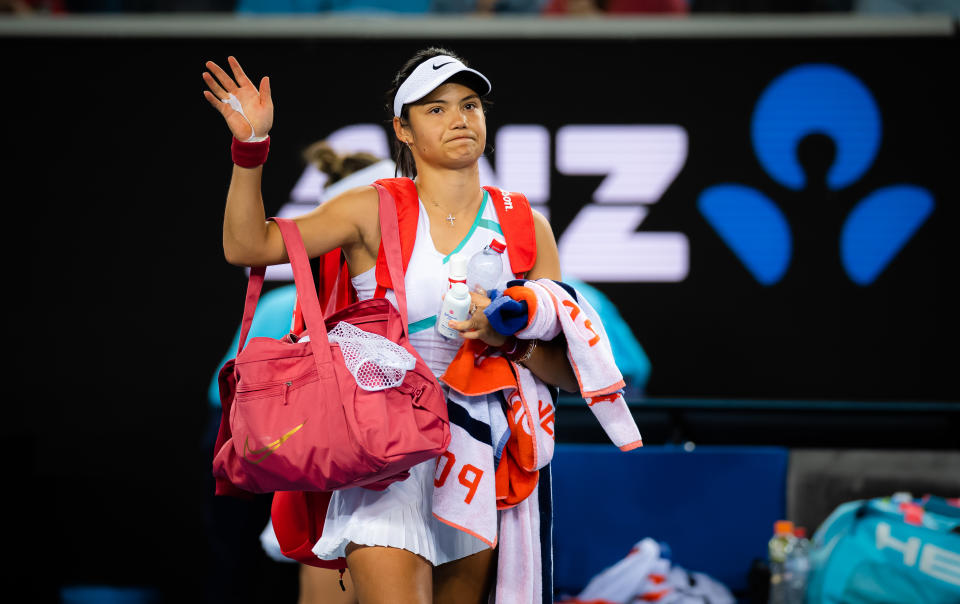 MELBOURNE, AUSTRALIA - JANUARY 20: Emma Raducanu of Great Britain walks off the court after losing her second round singles match against Danka Kovinic of Montenegro at the 2022 Australian Open at Melbourne Park on January 20, 2022 in Melbourne, Australia. (Photo by Robert Prange/Getty Images)