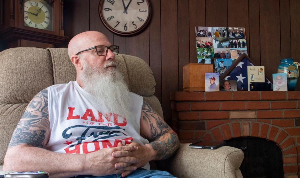 John Markle sits in his father's favorite chair at his home in York. His dad, Charles Markel died on May 27. The day the obituary published on June 1, he received a scam call from someone posing as an employee of the funeral home who tried to get personal data from him for alleged extra funeral charges. 