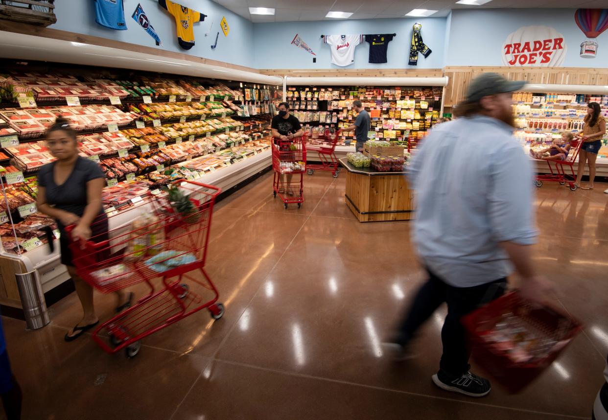 Customers shop at a Trader Joe's store Friday, Aug. 27, 2021 in Franklin, Tenn.